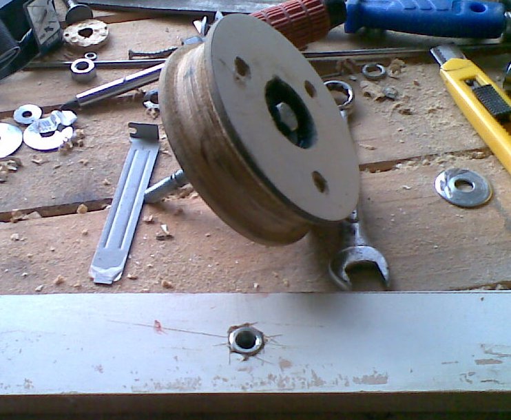bolt mounted in a small beam to hold the clutch
