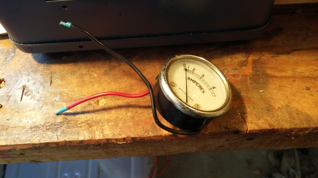 The original amp meter. It wont work unfortunately as the amperage on both sides is too high, but it fits the hole and looks cool so its going back in until I find a better use for it. A little heat shrink on the ends will keep it safe