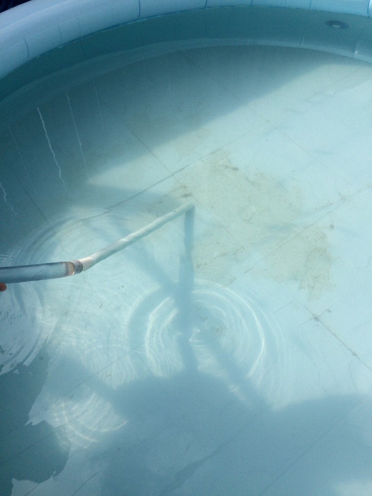 home made pool cleaner in the water and working